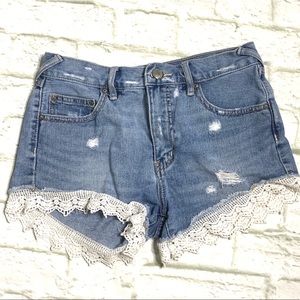 Free People denim lace trim distressed shorts